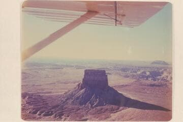 Tower Butte; Navajo Canyon in the background.  Leche-e Rock at right in distance