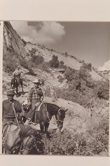 Down the trail into Navajo Canyon.  Bahe at left with Bill Belknap behind him and Jorgen Visbak beyond