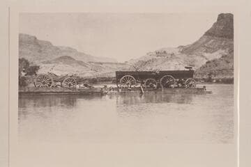 Spencer's camp wagons on Lees Ferry.  From Charles Spencer collection, p.86, lower right