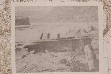 Small launch- Tipton's Mullins boat- up river from the Spencer placer operations at Lees Ferry