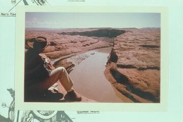 Bill Belknap at the top of the wall at Mile 109 3/4 looking onto Iron Rock Island as Lake Powell submerges it