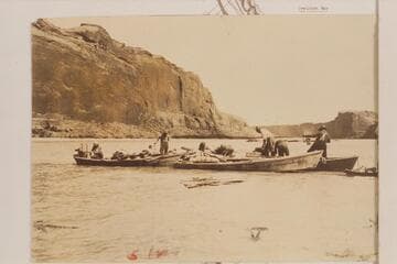 Bailing the skiffs, Glen Canyon, Mile 112.  The LaRue junket in Glen Canyon studying dam sites