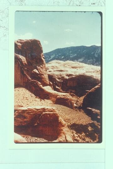 Up Bridge Canyon with Navajo Mountain in distance from top of Rainbow Bridge