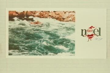 Jorgen Visbak's photo of one of the small inflated craft in Houserock Rapid.  On the back he writes, "I believe it is from the head of Houserock that I am sending you my best wishes."