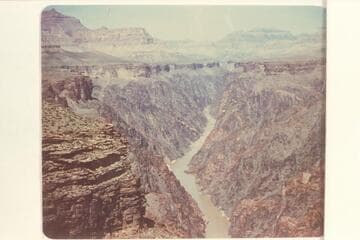 Downriver from top of Tonto at edge of gorge at Mile 80.1. Grapevine Rapid is in middle distance, Mile 81.5. The river disappears at Boulder Creek near Mile 83. Isis and Shiva are upper right