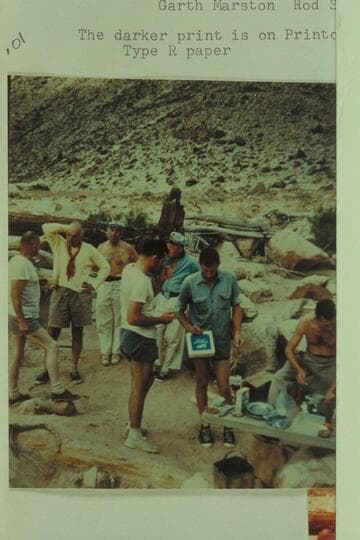 The crew of the 1956 Grand Canyon motor cruise.  At camp above Soap Creek Rapid