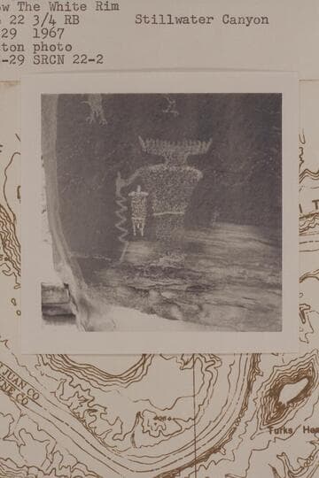 Pictograph on up-river of two large boulders at foot of talus below the White Rim; Mile 22 3/4, Stillwater Canyon