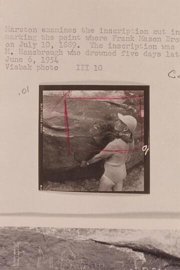 Marston examines the inscriptions cut in the Canyon wall marking the point where Frank Mason Brown was drowned on 1889, July 10