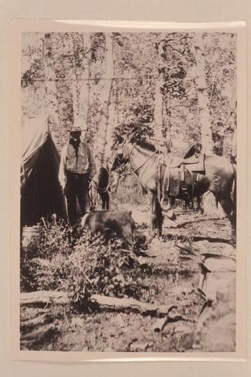 A. P. Ballard and his indian mule Zang; one of the brothers