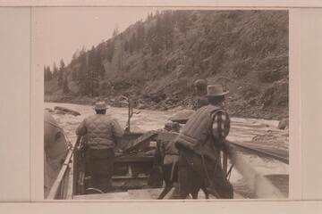 Tom Staley, Don Smith, Carl Kriley.  Running a riffle of the Salmon River