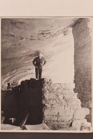 Bill Belknap hunting for pictures at the ruin in Marsh Pass