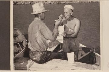 Frank Wright and Moulty Fulmer get into some ice cream at the end of the 1948 traverse of the Grand Canyon