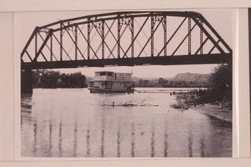 Steamboat "City of Moab" at Green River Bridge.  The "City of Moab" was propelled by marine gasoline engines operating twin screws