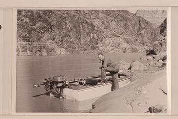 Bill Belknap at Jordan's outboard boat near Mile 234.  Belknap and Jordan ran up to this point and waited for the 1952 power cruise of the Wright-Rigg party in May