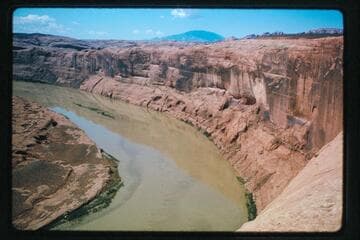 Lake Powell floods Poor Man's Placer; Navajo Mountain at right