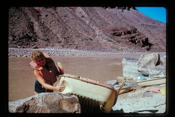 Robin Segerblom shows dent in her Sportyak; Hance Rapids
