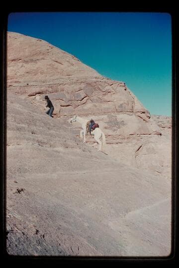 Tobe Owl climbs trail out of Moepitz Canyon
