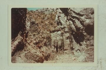 Left bank of Hakatai Canyon a few hundred feet from mouth showing built sections of trail leading up left wall of canyon.  It certainly looked as if it went to bar just above mouth of canyon where cable used to be