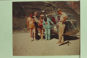 Helicopter and crew on beach at Tapeats Creek.  Left to right:  Taylor, Desloge, Marston, Forcier, Margaret Marston and "Red" Carson