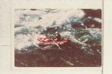 Run of Sockdologer Rapid in small inflated craft.  Ed Herrman; Howard Booth; Jorgen Visbak