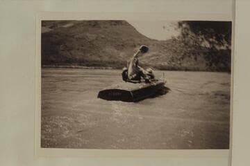Marston's motorboat "Hudson" pulls out from the landing at Lees Ferry, starting a transit of the Canyon.  The crew is made up of Joseph Desloge; Guy Forcier; Dock Marston; Jordan Rust.  Lees Ferry gauge:  51,800 cfs