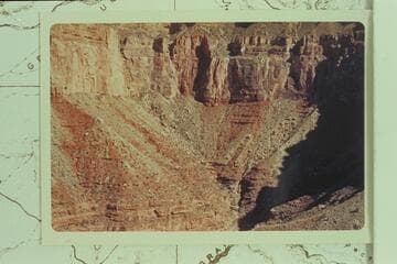 Steep talus at head of bay between Great Thumb Point and Tahuta Point, in the most southerly part of the bay.  This rough ground bars the horses from progress up the Grand Canyon and the burro from going down