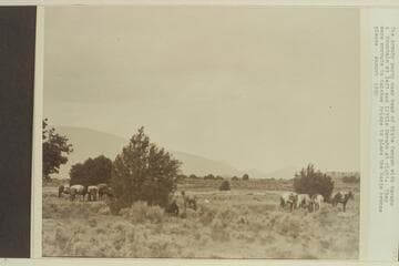 The Armsby party near head of Piute Canyon with Navajo Mountain at left and Little Navajo at right