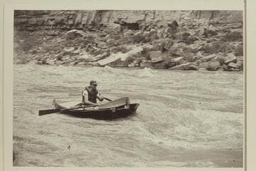 Jack Wimpress taking "Ugh Ptui" through Slickhorn Rapid