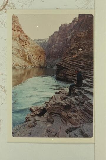 Dye sitting on ledges at mouth of Matkatamiba Canyon