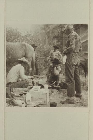 Breakfast at camp at head of middle fork of 73.  Tom Daly and Buster Ordiway on the ground.  Archeyes Masland looks hungry.  Nasja Begay and Dan Leho in background