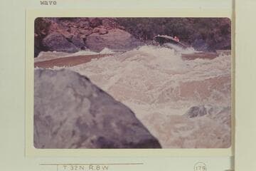 The "Triangle" heading into Vulcan Rapid with Jim Bechtel driving and Bob Valentine riding.  Bechtel is off course to the right about 25 ft. and this got him into trouble when he topped the first wave