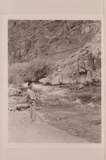 Clint Seymour gathers a few rainbow trout from Tapeats Creek