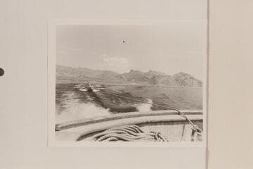 The Nevills sadirons being towed down Lake Mead by the Bureau of Reclamation cruiser