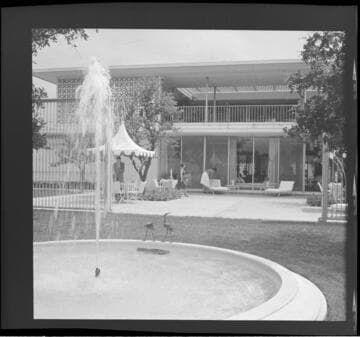 [Candid photographs of House Beautiful staff]