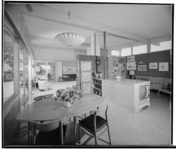 [Unidentified living and dining areas]