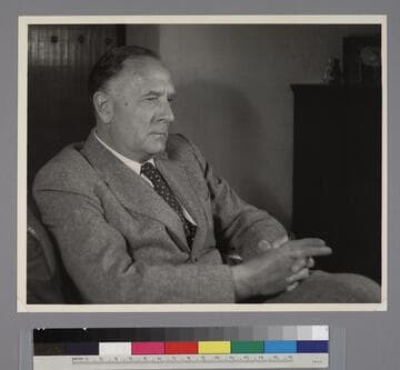 Portrait of Edwin Powell Hubble, seated
