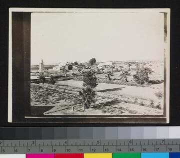 Unidentified buildings and water tower