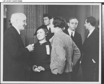 Harry Chandler socializing at his 80th birthday celebration