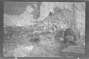 Dam 1.  Area near station 5-66, elevation 6904 Chipping in progress