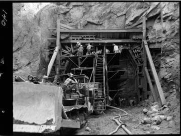 Big Creek - Mammoth Pool - Drilling for diversion tunnel intake, showing Jumbo in place