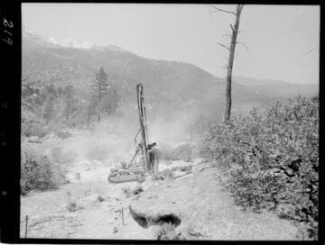 Big Creek - Mammoth Pool - Drilling on the Daulton Creek diversion channel at Sta. 11 & 12