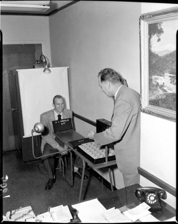 Photographer taking employee ID photo