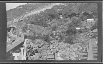 View of the junction of the Tule Plant flume and the plant of the San Joaquin Light and Power Company