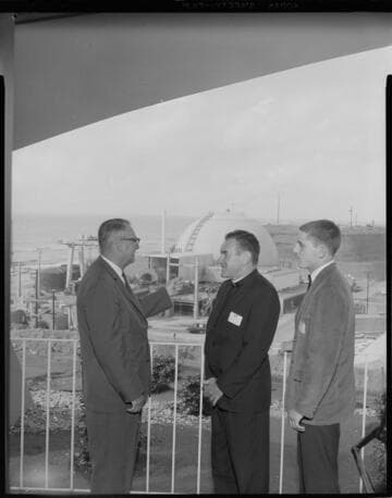 A man and a young man with an Edison rep