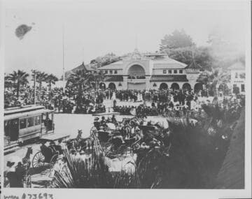 A concert in the bandshell on the second floor of the Bath House has drawn a large crowd