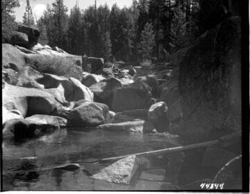 First Fish Barrier above Huntington Lake, about 500 feet above shore of Lake near old Trail Crossing. Estimated flow