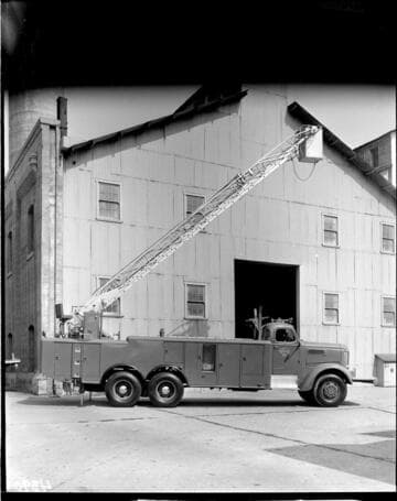 Edison bucket truck with bucket raised and extended