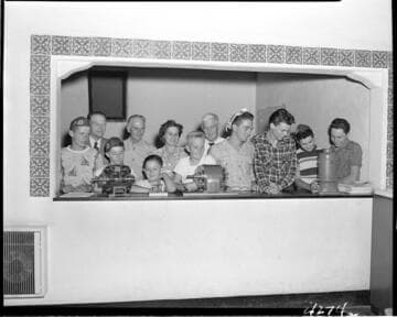 4-H Club kids looking at a display of electric motors