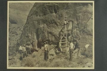 Mason preparing the wall for the placing of the plaque at Rainbow Bridge