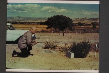 Dock Marston at grave of Frank V. Goodman.  Galloway grave in background